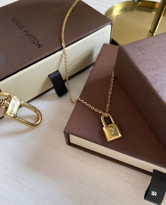 Authentic LOUIS VUITTON vintage LV padlock pendant on necklace