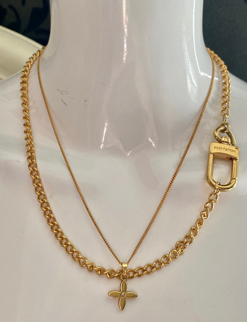 Authentic reworked Louis Vuitton small charm necklace.